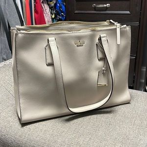 Gorgeous pink Kate spade bag with navy and off-white interior